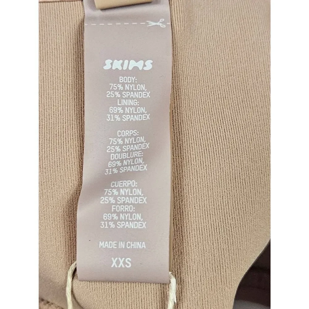 Skims bandeau swim top Nwt‎